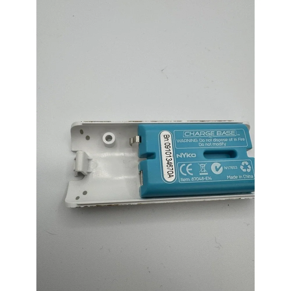 NYKO Nintendo Wii Remote Battery Grip Cover Door Lid Cover W/ Battery